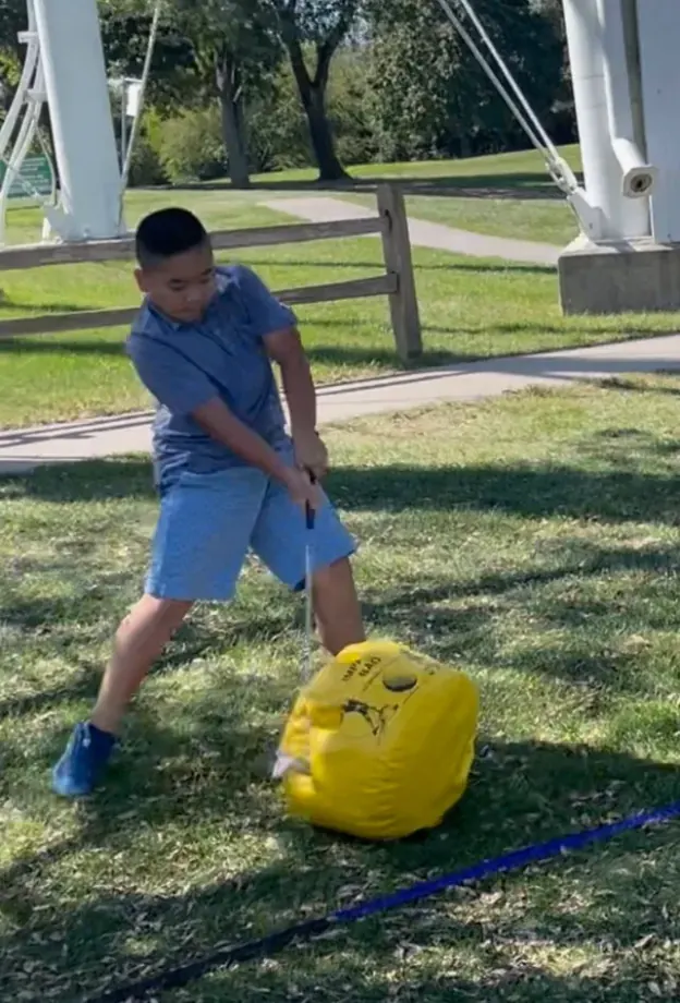 junior golfer at Pine Lake