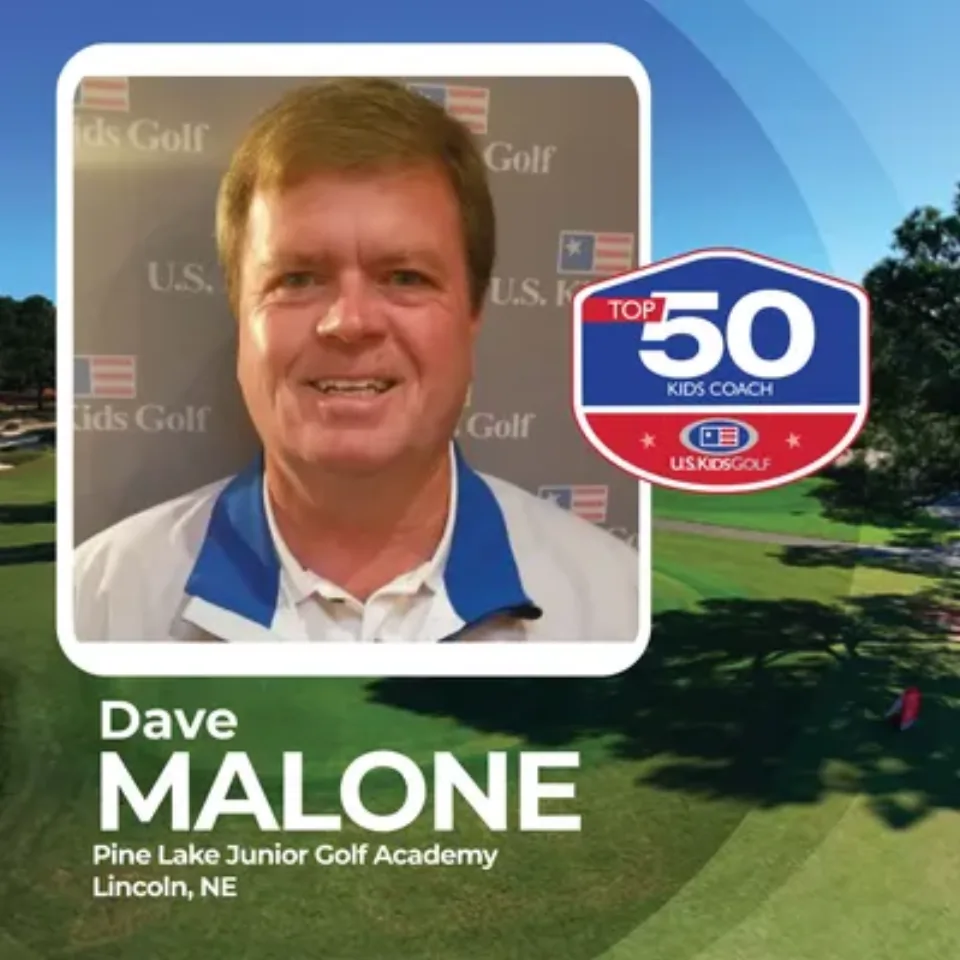 Dave Malone speaking at a golf event